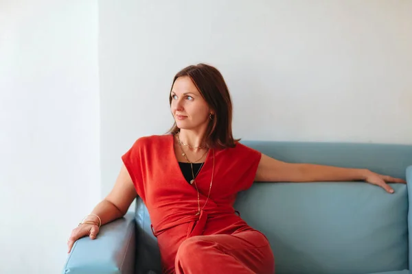 Cheerful Mature Female Stylish Red Dress Smiling Looking Away Gray — Stock Photo, Image