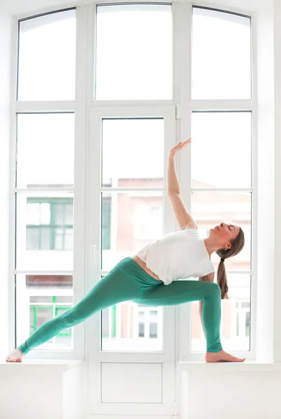 Calm Female Sportswear Practicing Yoga Firefly Pose While Balancing Looking — Stock Photo, Image