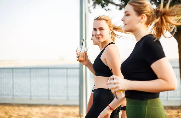 Young Female Sportswear Smiling Looking Away While Standing Girlfriends — Stock Photo, Image