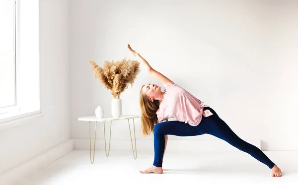 Calm Female Sportswear Practicing Yoga Firefly Pose While Balancing Looking — Stock Photo, Image