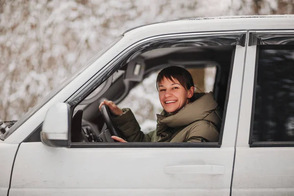 Cheerful Female Smiling Looking Camera While Driving Modern Vehicle Blurred — Stock Photo, Image