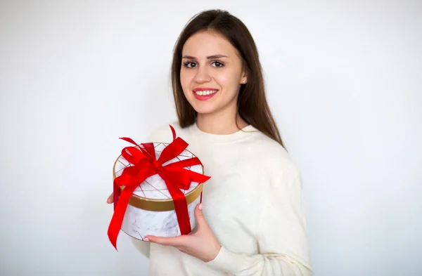 Young Girl White Sweater Holding Present Box Tied Bright Red — Stock Photo, Image