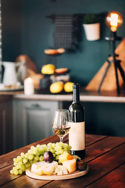 Glasses White Wine Delicious Cheese Green Grape Wooden Table Dark — Stock Photo, Image