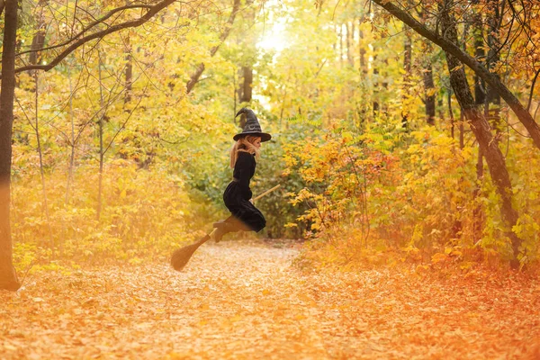 Woman Witch Costume Flying Broom Path Covered Autumn Leaves Halloween — Stock Photo, Image