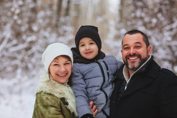 Cheerful Parents Walking Glad Boy Sleigh While Spending Time Snowy — Stock Photo, Image