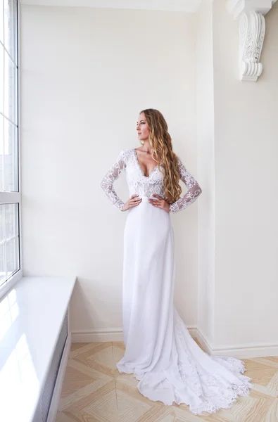 The beautiful bride in an interior — Stock Photo, Image