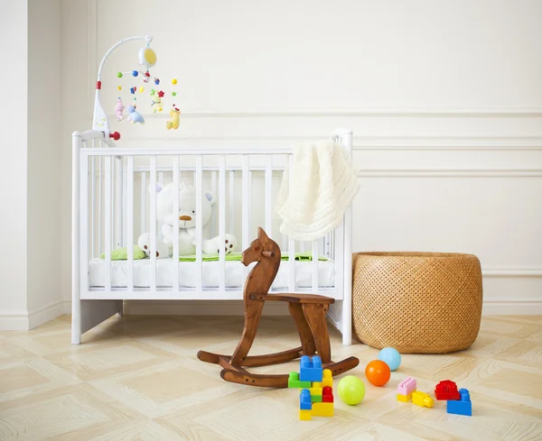 Empty cozy nursery room in light tones — Stock Photo, Image