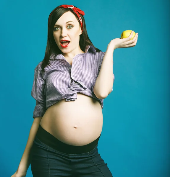 Happy young funny pregnant woman in pin up style — Stock Photo, Image