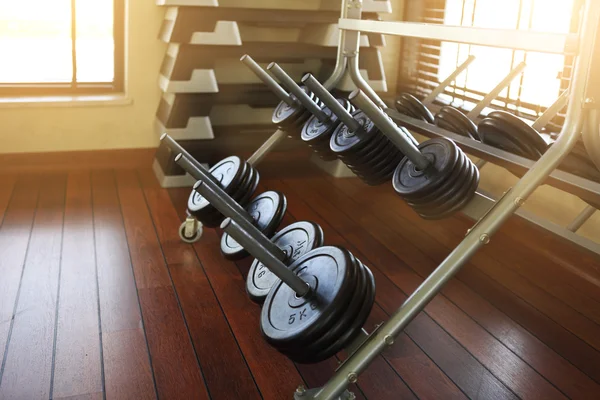 Dumbbells in modern sports club — Stock Photo, Image