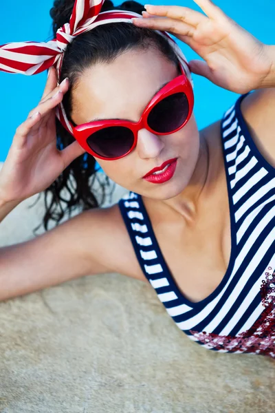 Beautiful pin up girl near the swimming pool — Stock Photo, Image