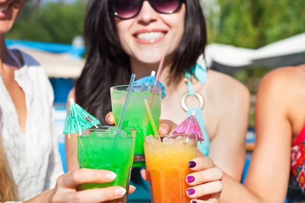 Happy girls with beverages on summer party — Stock Photo, Image