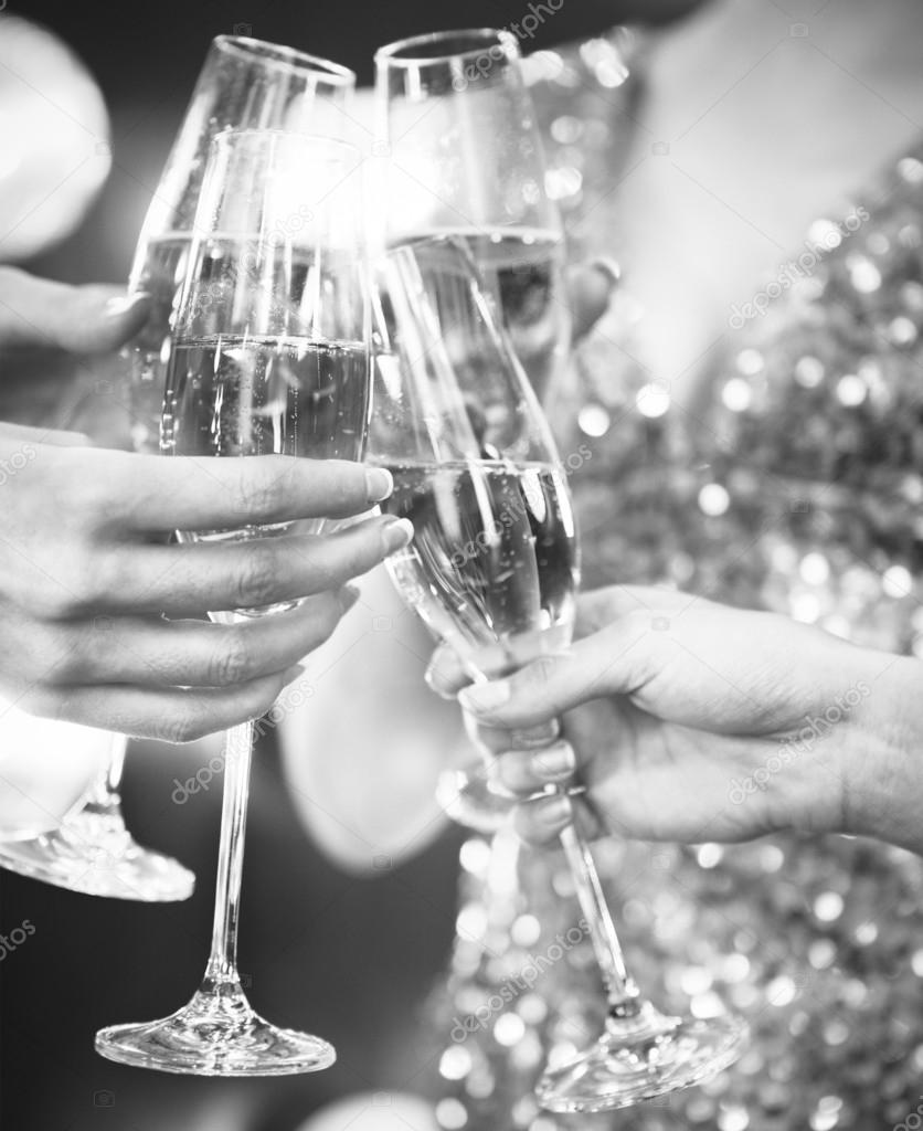 Celebration. People holding glasses of champagne making a toast