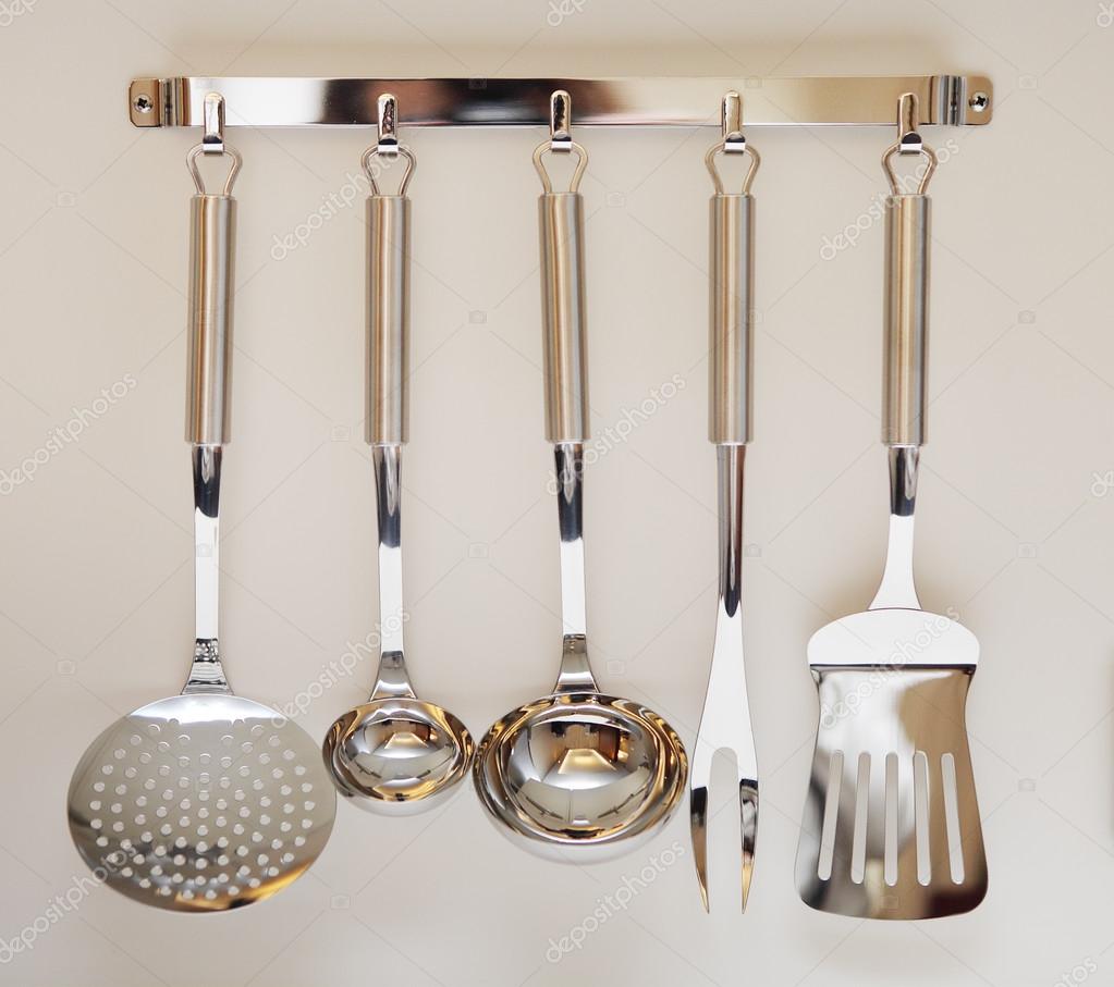 Set of black modern kitchen utensil hanging Stock Photo by