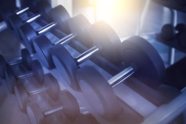 Dumbbells in modern sports club. Weight training equipment — Stock Photo, Image