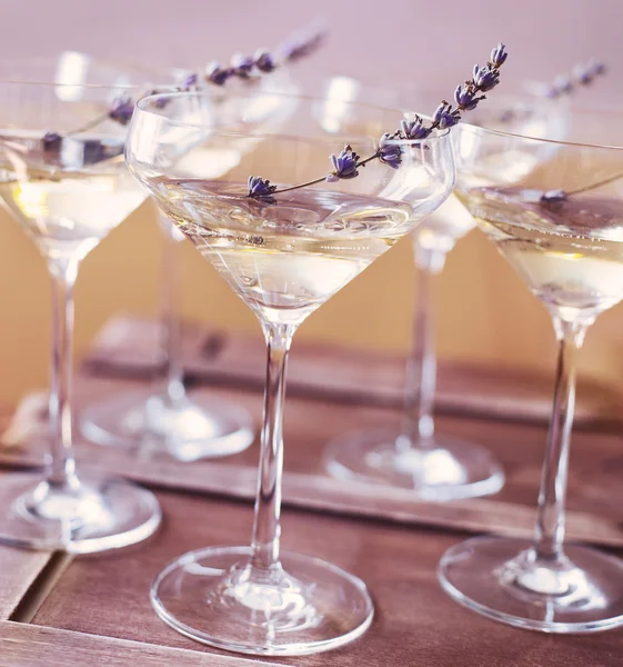 Glasses of champagne decorated with lavender