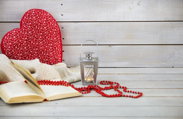 Christmas still life with lantern and red beads on wooden backgr — Stock Photo, Image