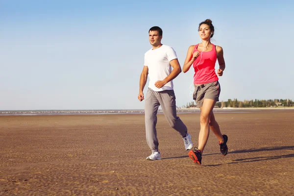 Runners training outdoors working out in nature — Stock Photo, Image