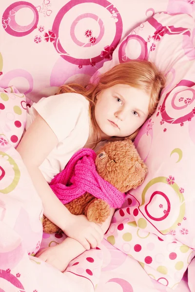 Ill girl with toy — Stock Photo, Image