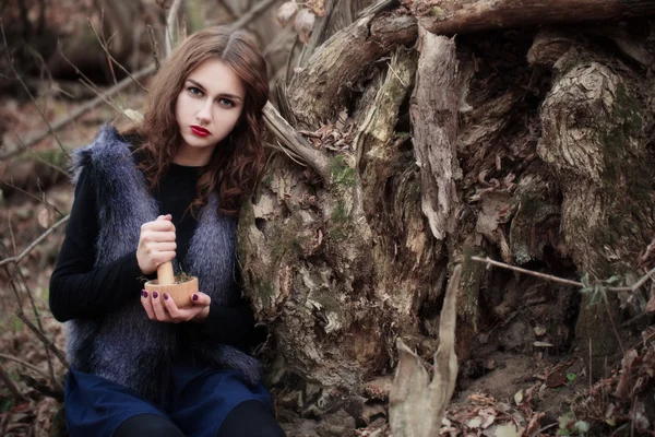 Young witch  in forest — Stock Photo, Image