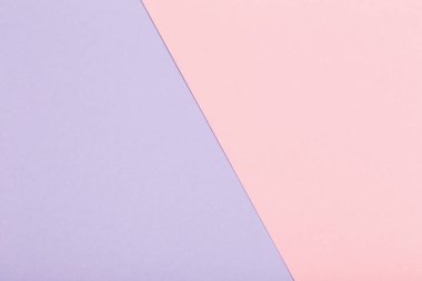 Pembe ve menekşe renkli kağıt yapraklarının arkaplanı