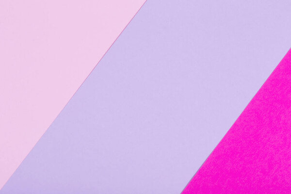 Фон из розовых и фиолетовых пастельных листов бумаги
