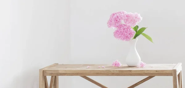 Pink Hydrangea White Vase Wooden Shelf Background White Wall — Stock Photo, Image