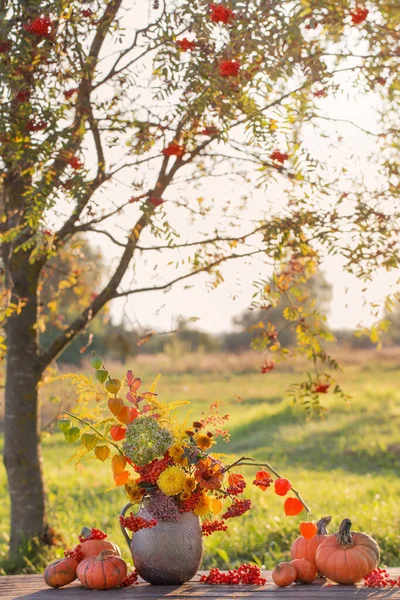 Bouquet Autumn Flowers Rustic Jug Wooden Table Outdoor Sunset — Stock Photo, Image