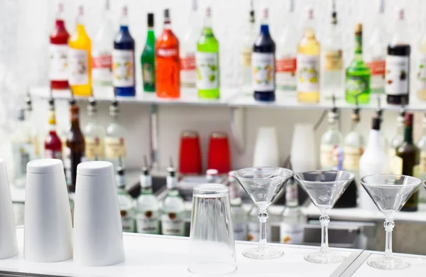 Front bar with glasses and shaker — Stock Photo, Image