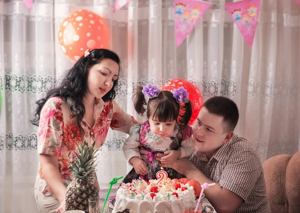 Happy daughter on her birthday's day with her family — Stock Photo, Image