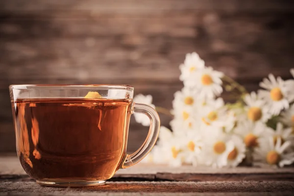 Cup of chamomile tea — Stok fotoğraf