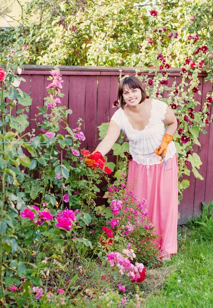 Women with flowers outdoor — Stock Photo, Image