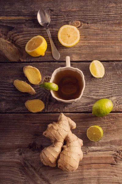 Ginger tea with lime in a white cup — Stock Photo, Image
