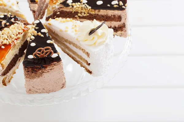Cake on white wooden background — Stock Photo, Image
