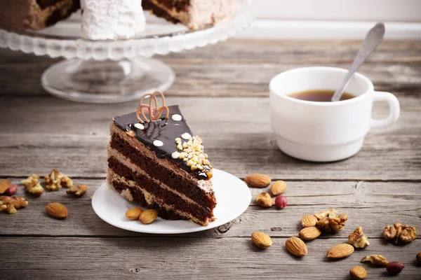 Cake on old wooden background — Stock Photo, Image