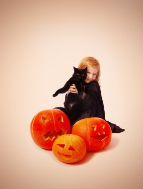 Kız ile bir takım elbise witchwith siyah kedi