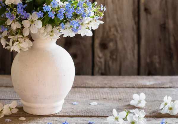 Flowers on wooden background — Stock Photo, Image