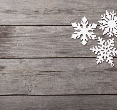 Grunge ahşap arka plan üzerinde kar taneleri