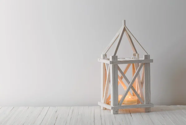 White wooden vintage lantern with burning candle on white backgr — Stock Photo, Image
