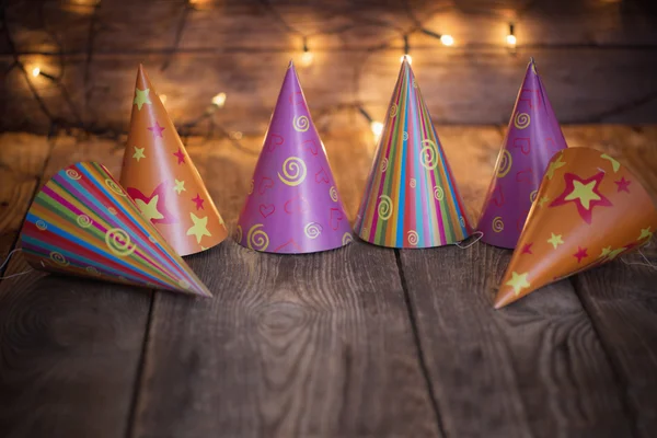 party hats on old wooden  background