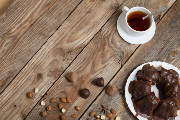 Cake on old wooden background — Stock Photo, Image