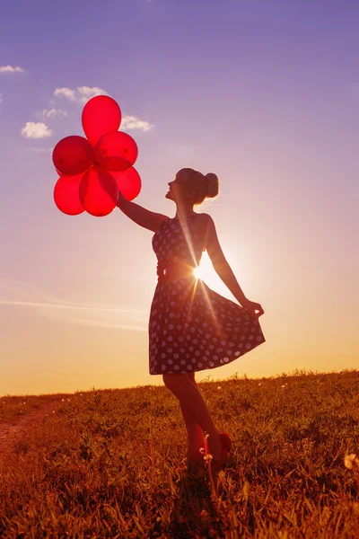 Beautiful women with balloons — Stock Photo, Image