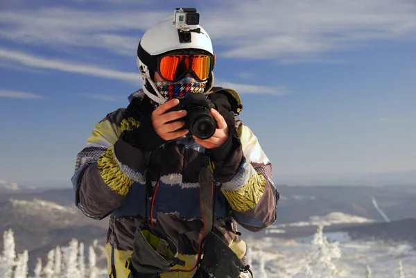 Snowboarder with camera — Stock Photo, Image