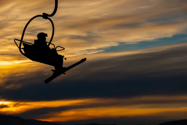 Skier on chair lift — Stock Photo, Image