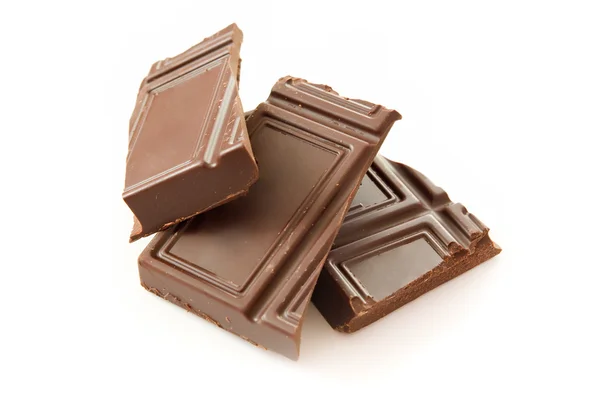 Pieces of milk chocolate — Stock Photo, Image