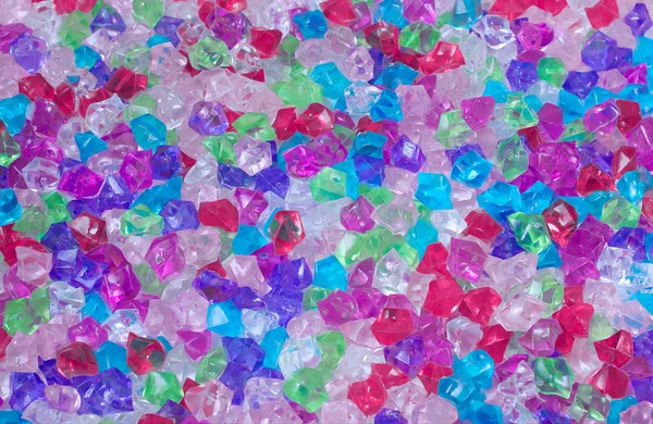 Fundo de cristais decorativos coloridos — Fotografia de Stock