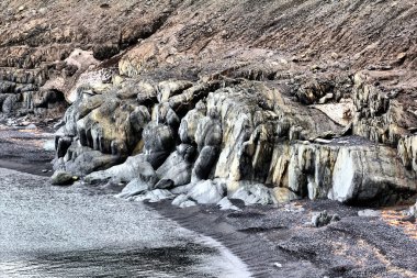 Fosilleşmiş dinozorları. Aşınma ve Barents Denizi kıyısında. Arctic