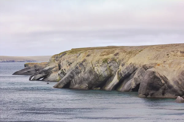 Boningen nymfer och Proteus: bisarra klippiga kusten av Novaja Zemlja skärgård, Barents hav. — Stockfoto