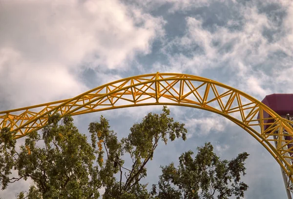 Durable metal - arched design of profiled metal and pipes. Metal used in amusement parks to manufacturing carousels and amusement rides., metal structures, structural steel, tee bars, section