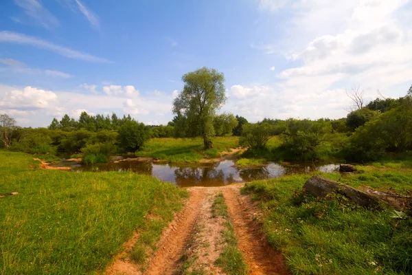 Route avec rivière ford — Photo