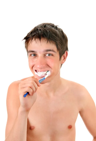 Joven lavándose los dientes —  Fotos de Stock